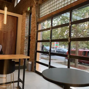 Seating area with garage door that lifts on the warmer days