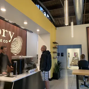 two men in a coffee shop