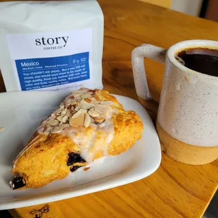 a pastry and a cup of coffee