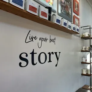 &apos;Live your best story&apos; message inside the shop. Everything inside is super adorable!