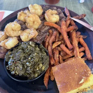 Surf N Turf with collard greens, sweet potato fries, and corn bread.