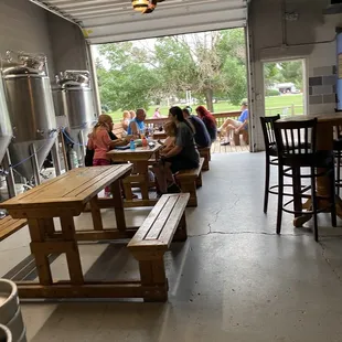a group of people sitting at tables