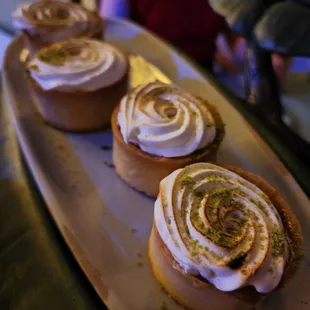 three pastries on a plate