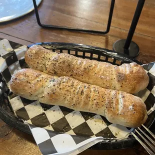 two baguets in a basket