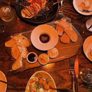 Top: Tomato Capri, Middle: Bread Board, and Bottom: Caesar Salad