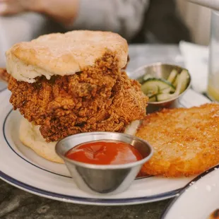 FRIED CHICKEN THIGH Large Grade AA chicken Thigh southern fried and served on a fresh baked buttermilk biscuit. Served with Bread n butter