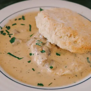 MUSHROOM GRAVY w/ herbed mushroom gravy poured over our open-faced buttermilk biscuit
