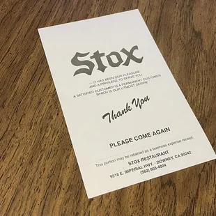 a thank card on a table