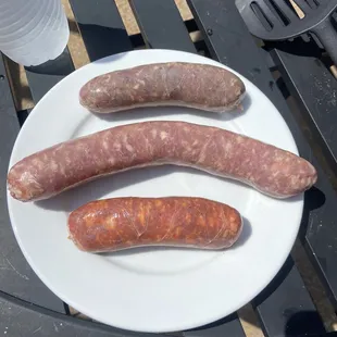 German, Polish and Italian Fennel and Garlic sausage about to be put on the grill.