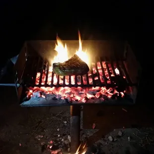 Two inch thick dry aged T-bone melt in your mouth holy grail of meat.