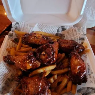 Chili tai wings and fries.