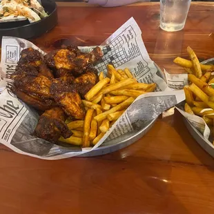 two baskets of food on a table