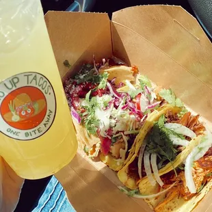 from left to right - Pineapple Agua Fresca, Potato Taco, Cauliflower Taco, Barbacoa Taco, Chicken Taco. DELICIOUS