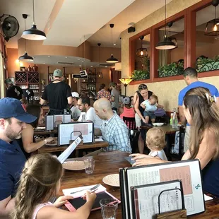 a group of people sitting at a table