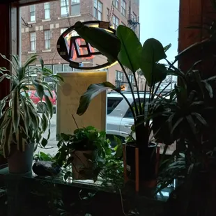 a view of a city street through a window