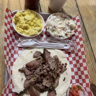 Brisket, coleslaw, potato salad, pico di gallo.
