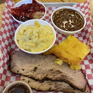 Brisket with Mac and cheese, baked beans, corn cake, and cherry cobbler.