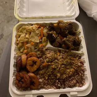 a meal in a styrofoam container