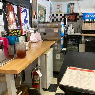 a restaurant kitchen with a checkered floor