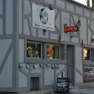 a building with a sign that says open