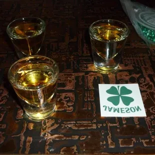 three glasses of beer on a table