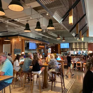 a large group of people sitting at tables