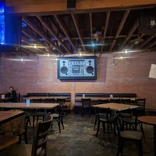 an empty restaurant with tables and chairs