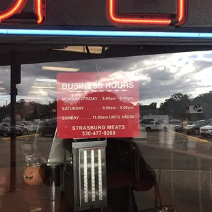 a business hours sign