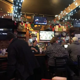 people sitting at a bar