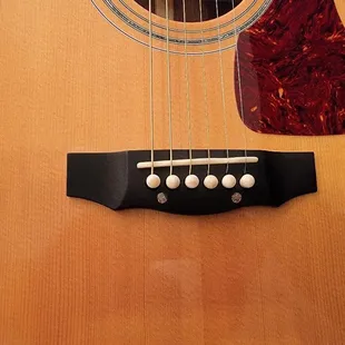 Guild D-55 bridge