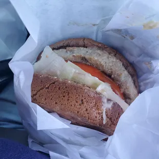 Turkey burger lettuce tomatoes and good seasoning.