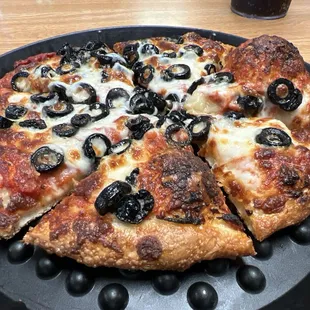 Personal cheese and black olives.