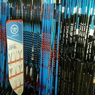 Hockey sticks from Warrior hockey and True hockey