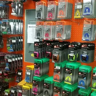 A whole wall of protective mouthguards.
