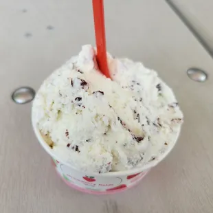 a cup of ice cream on a table