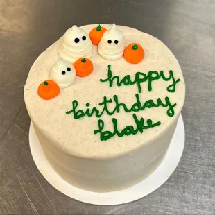 a birthday cake decorated with frosting
