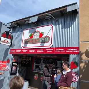 people standing in front of the store