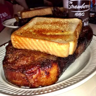Famous Pork Steak. More like a pork roast. Very tender, juicy and flavorful. Enough for 3 meals, comes w/3 sides. Go for it!