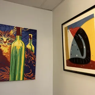 a cat and a bottle of wine