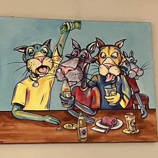three cats drinking beer