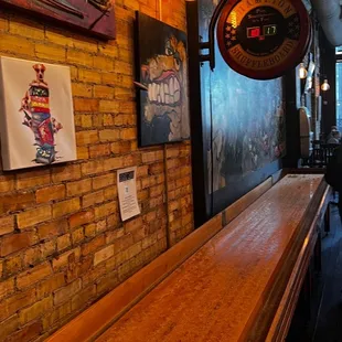 a bar with a long wooden table
