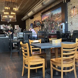 a restaurant with tables and chairs