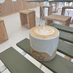 Hot vanilla bean latte in the pup cup.