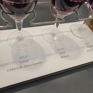 three glasses of red wine