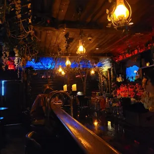 Awesome tropical decor. Perfect dimly light ambience with appropriate surf rock music playing in the background.