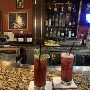 Sitting at bar top with (L) Blackberry Mojito (R) Blackberry Lemonade