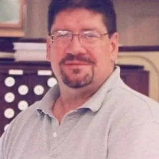 Mark C.