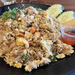 Fried rice with some type of fish, instead of the chicken I requested.