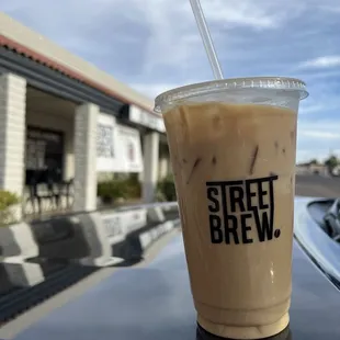 a cold beverage in a plastic cup