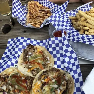 Pork tacos, chicken quesadillas and fries